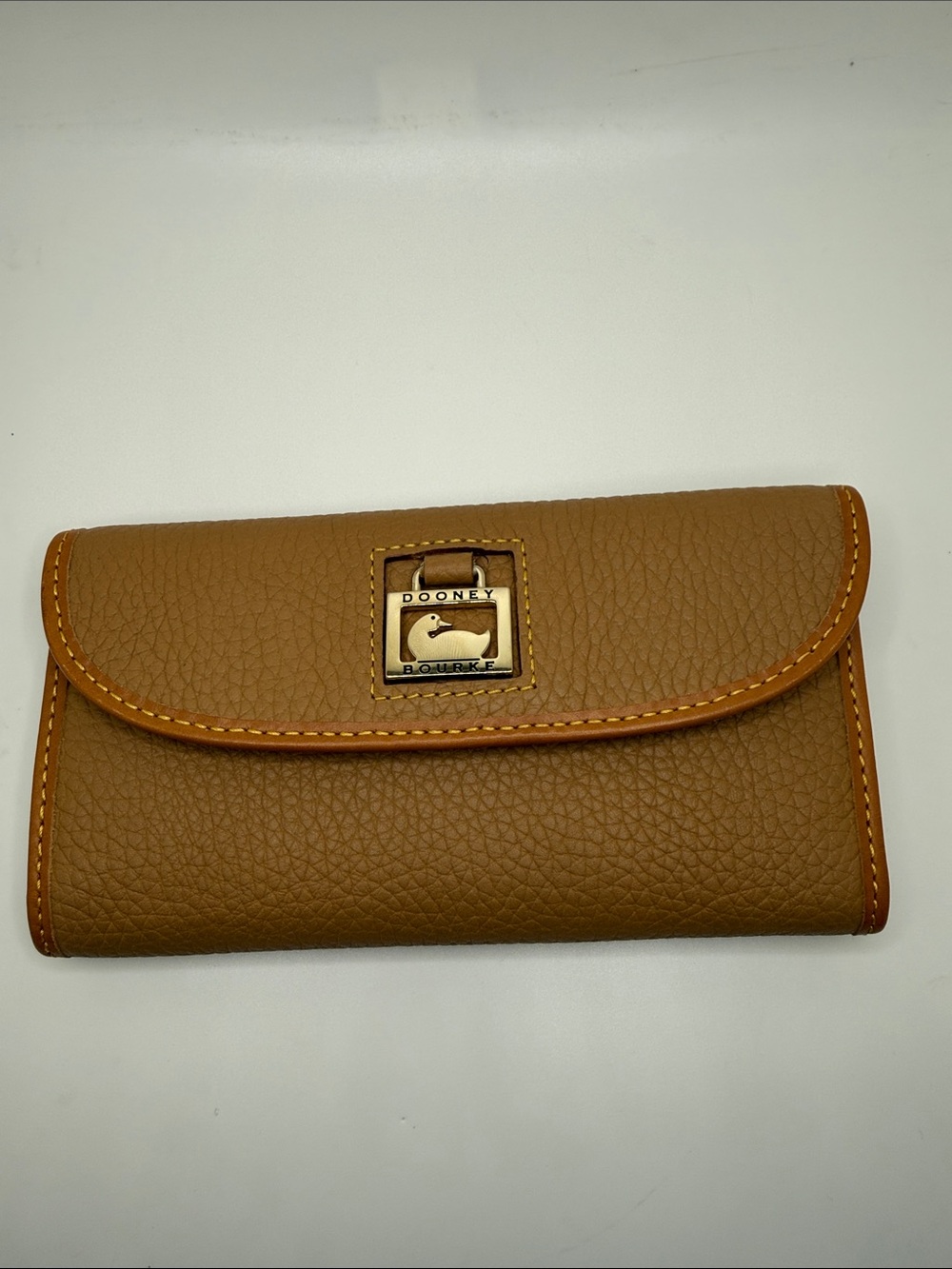 Dooney & Bourke Brown Pebbled Leather checkbook wallet